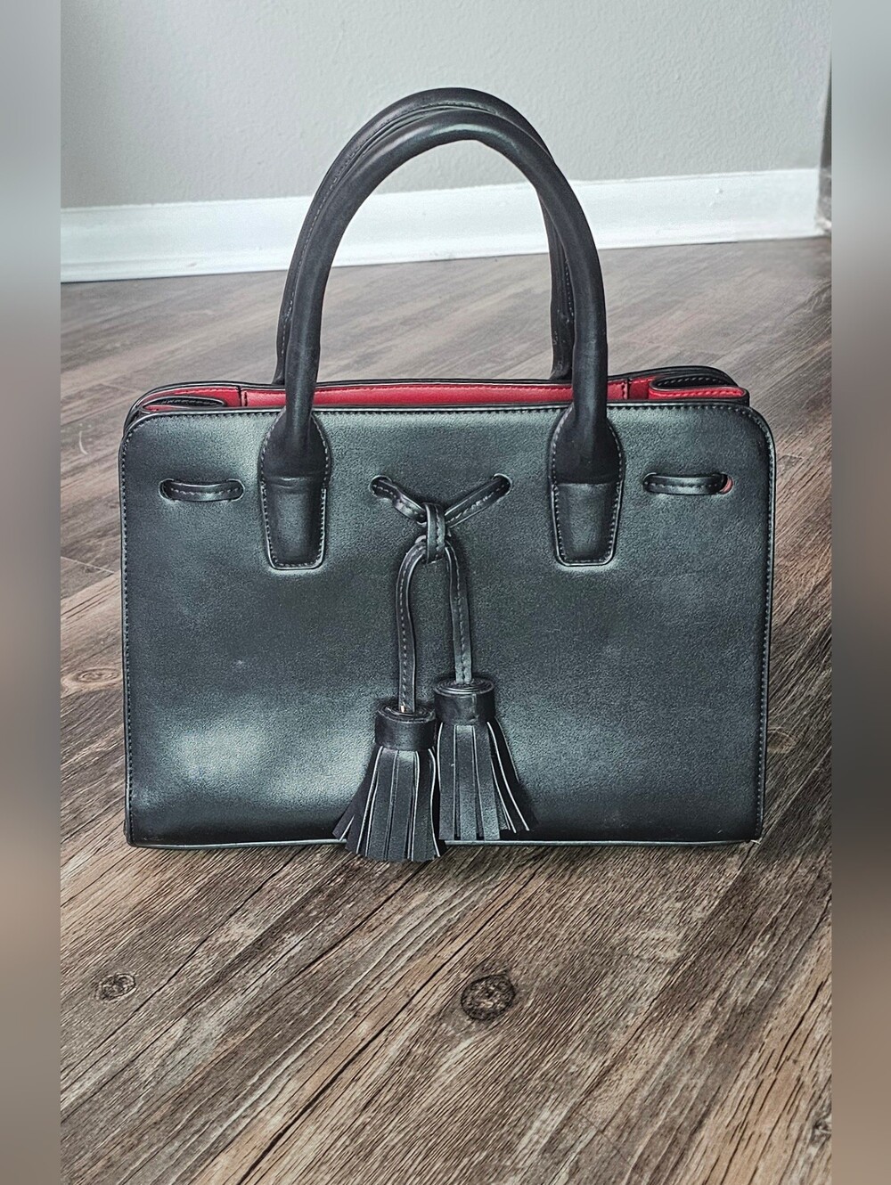 Charming Charlie Black Structured Tassel Satchel Purse with Red Interior